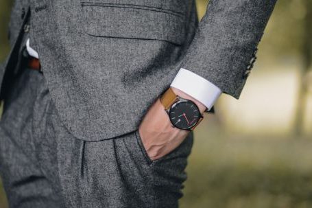 Trend - Man Wearing Watch With Hand on Pocket