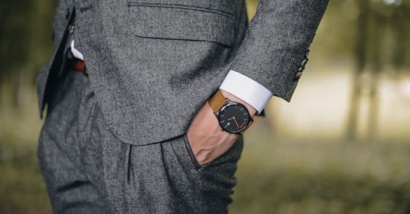Trend - Man Wearing Watch With Hand on Pocket