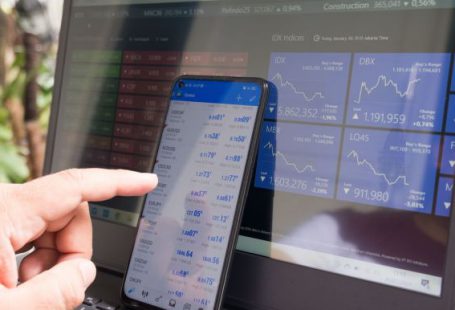 Stock Trading - black android smartphone turned on screen