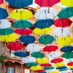 Stock Market - Assorted-color Opened Umbrella Hangs On Display